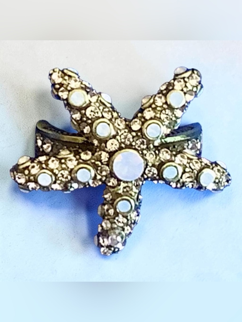 Ring- Heidi Daus  Starfish Ring in Gold Tone with Opalescent Crystals. Sz. 7